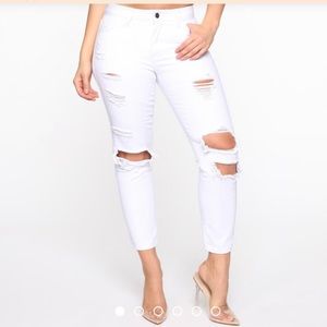 Distressed boyfriend jeans by Fashion Nova